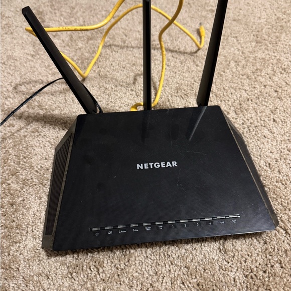 NETGEAR Black and Yellow Wireless Router - Picture 1 of 4